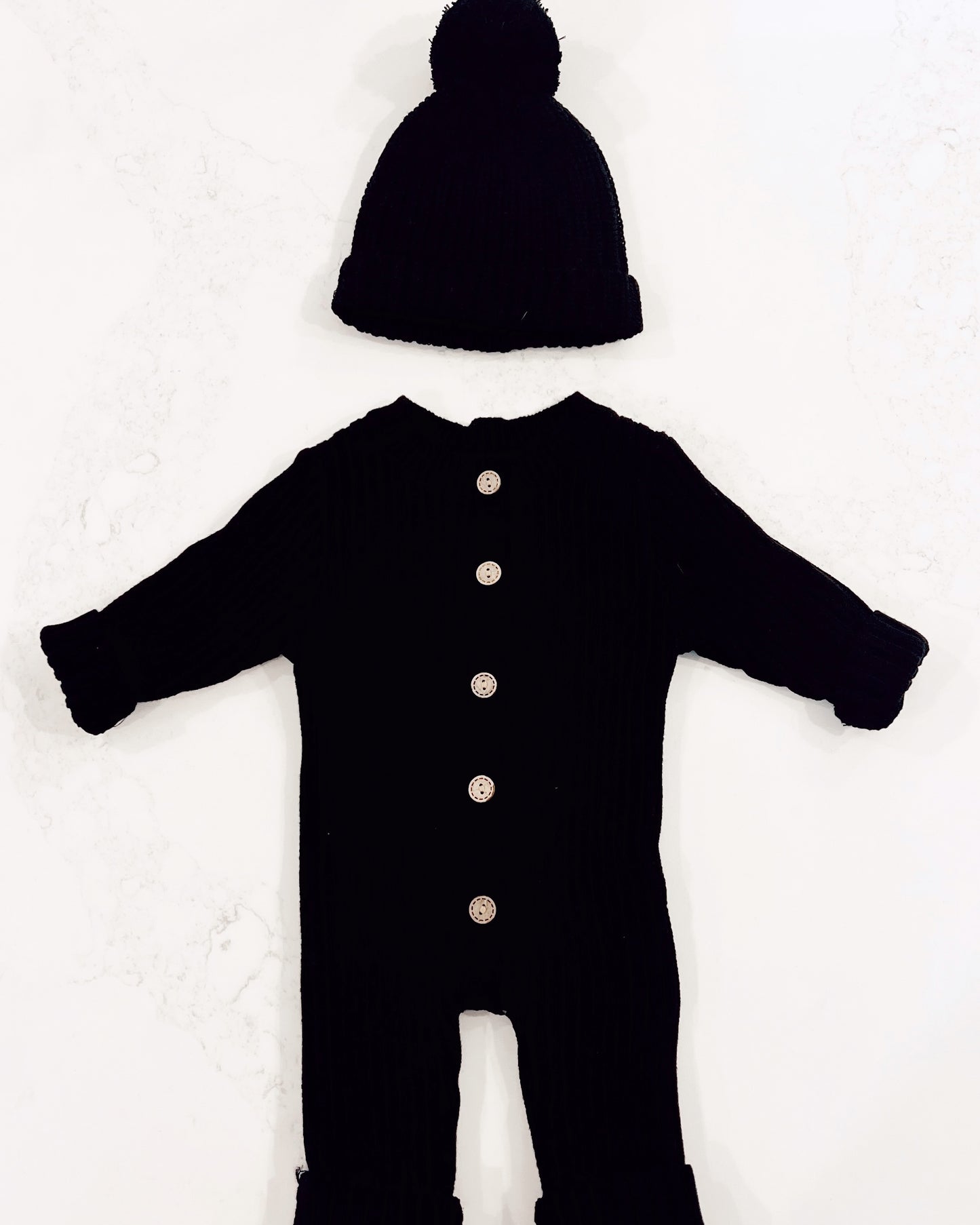 Black knit onesie